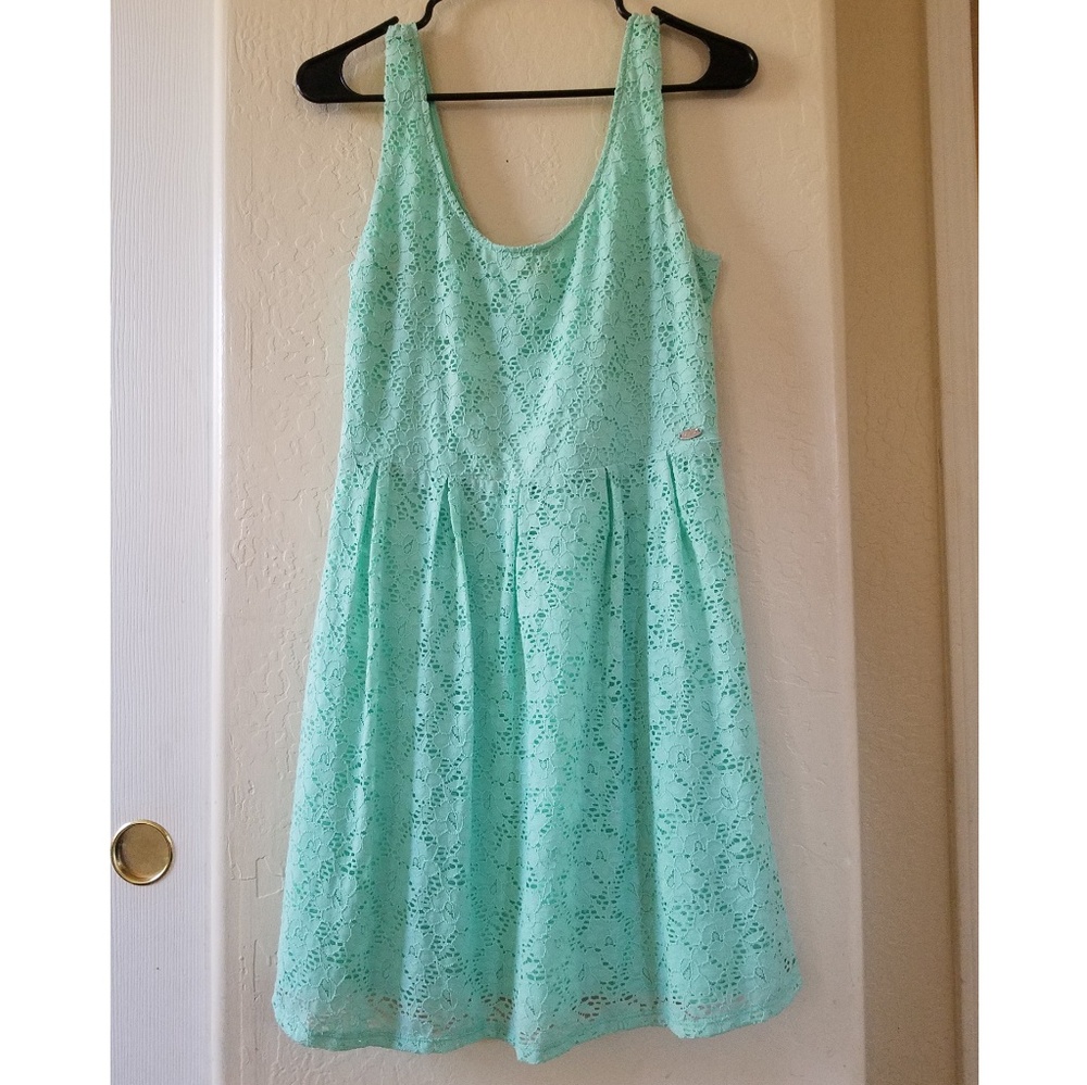 Gently pre-owned Guess laced dress.